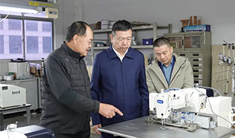 Yang Xiaojing, Chairman of the China Sewing Machinery Association, and his delegation visited Xiangtai for a tour and guidance